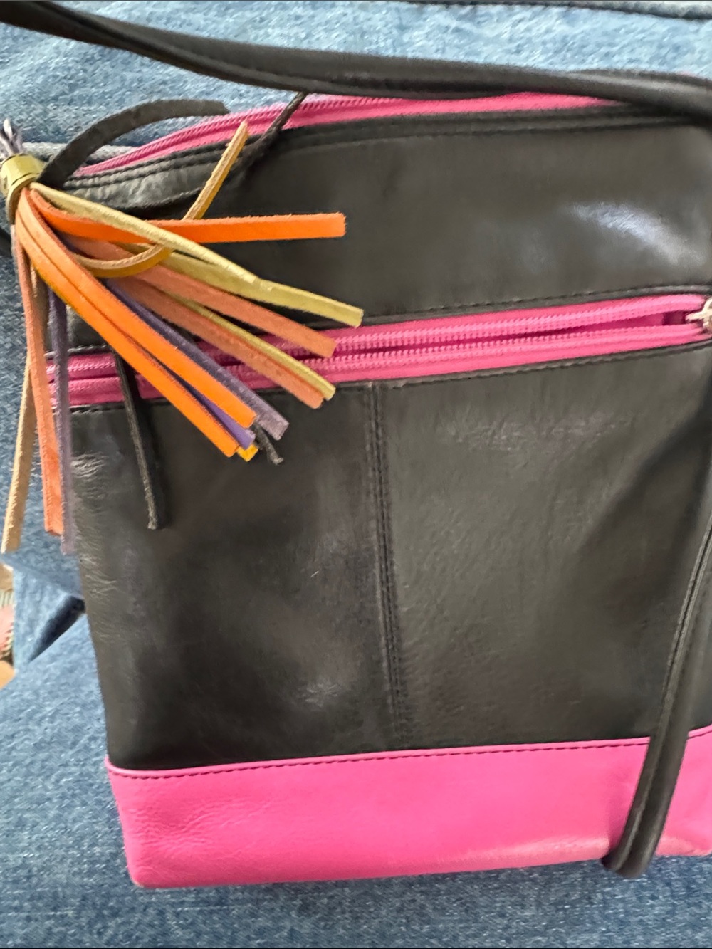 Black & Hot Pink Leather Crossbody Bag with Colorful Tassel Accent